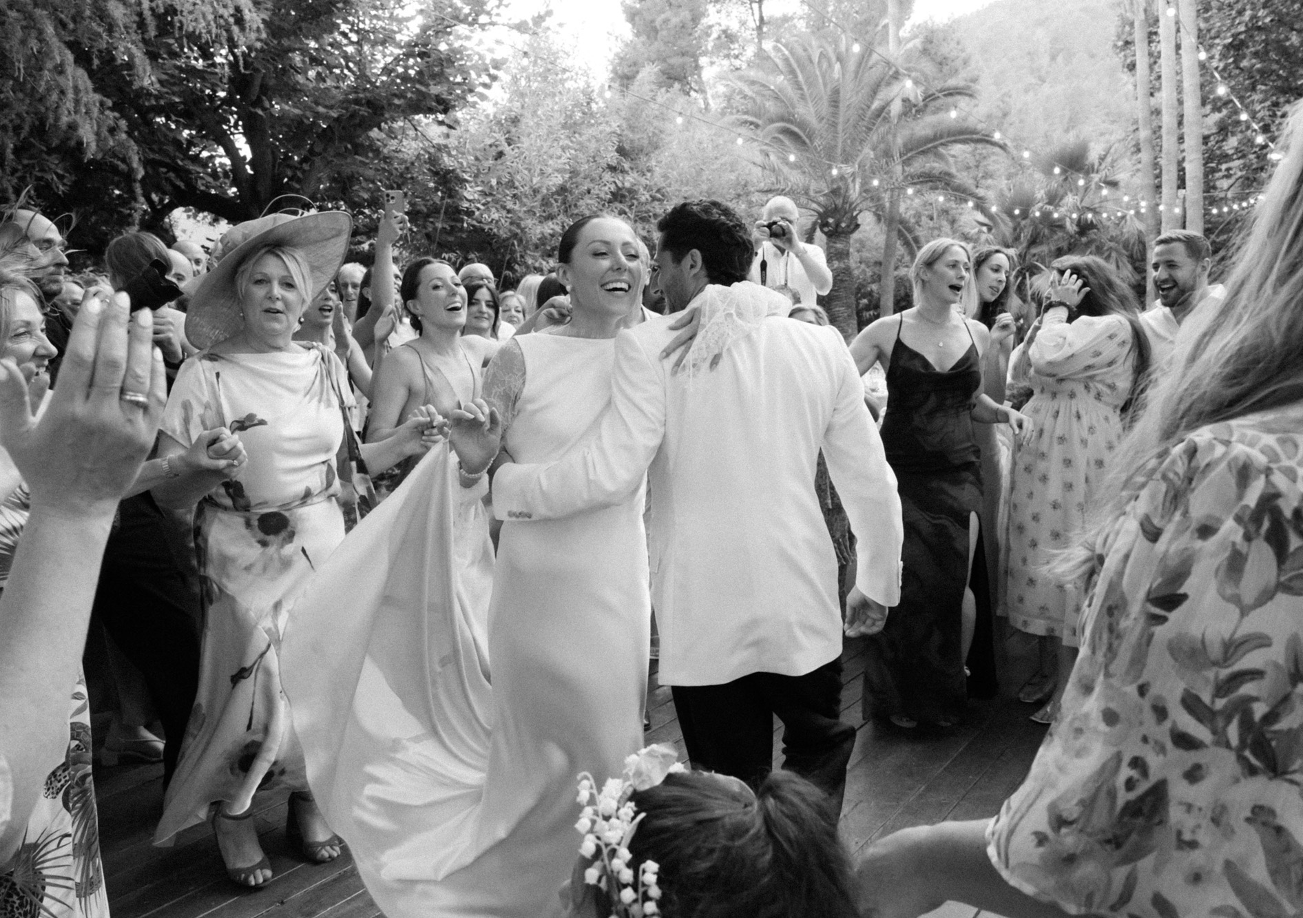 Guests celebrating on the dance floor at a wedding party