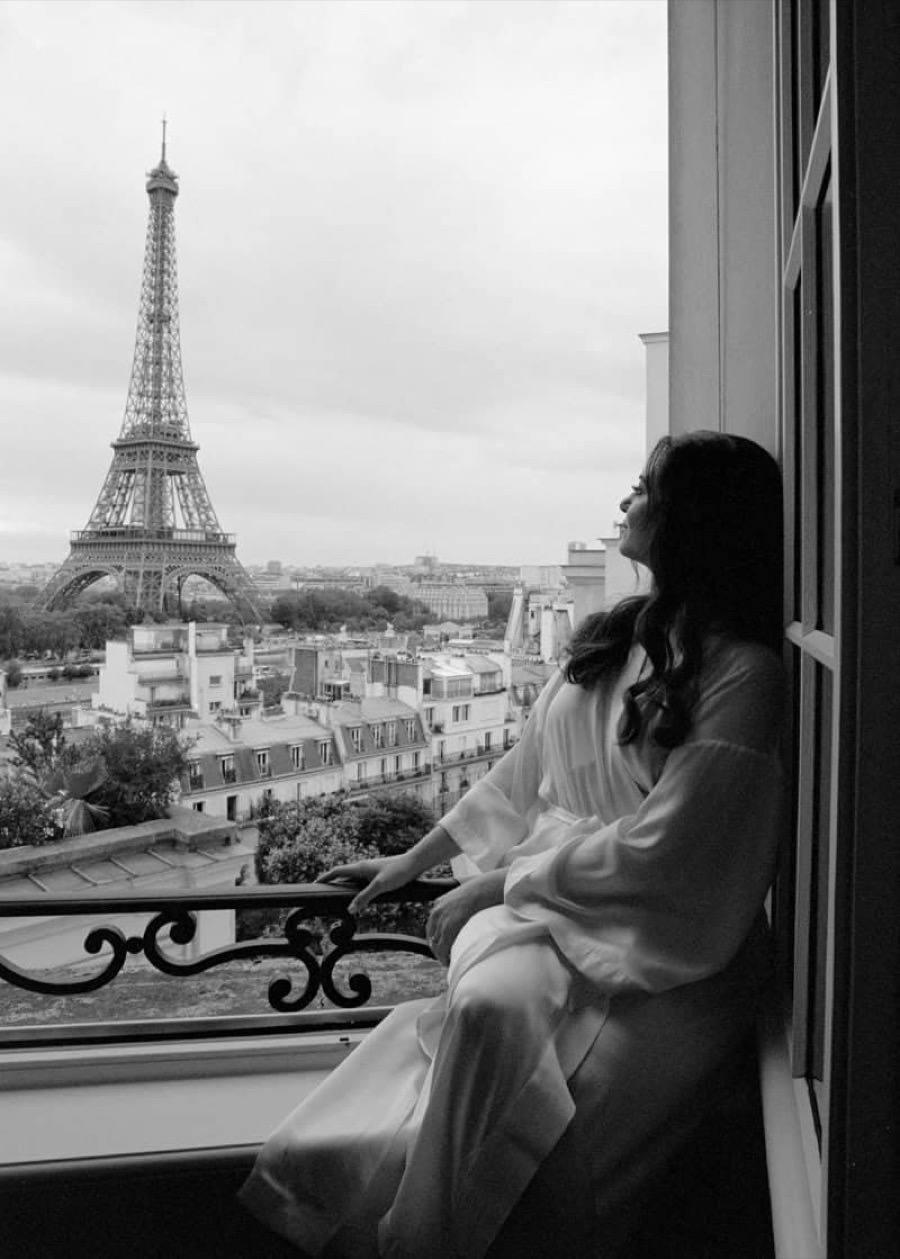 Bride in a bridal suit with Eiffel Tower views